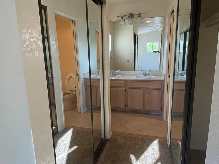 Bedroom 1: Both closet doors