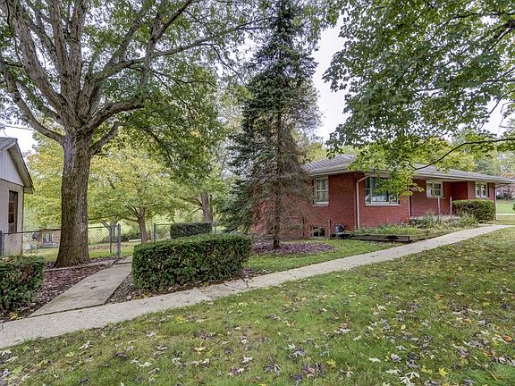 all brick ranch and 3 acres