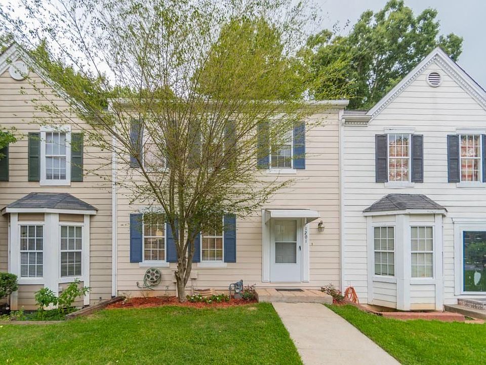 Grass has been removed to add 2 packing spaces