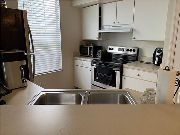 4th image of 9010 Lake Chase Island Way #9010