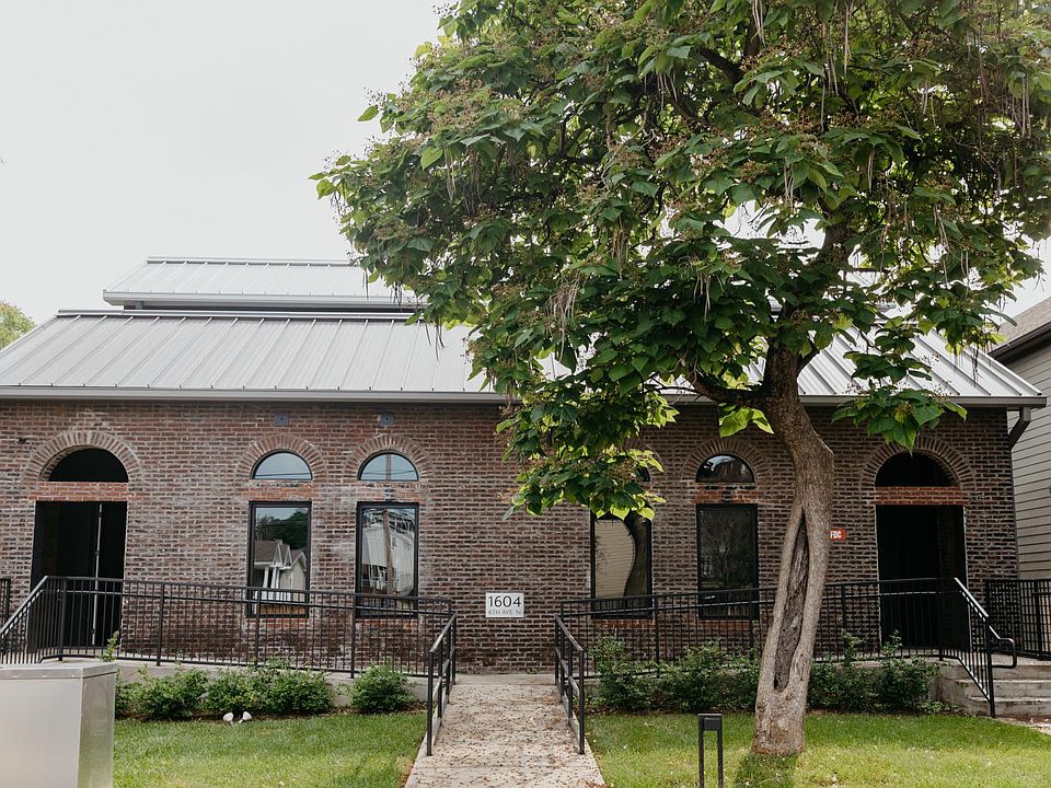 Front Entry, with greenspace and landscape lighting.