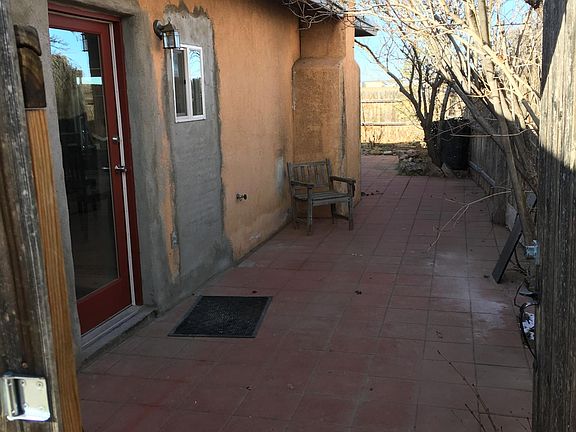 Looking at front door from gate. Stucco_ing will be finished by this summer.