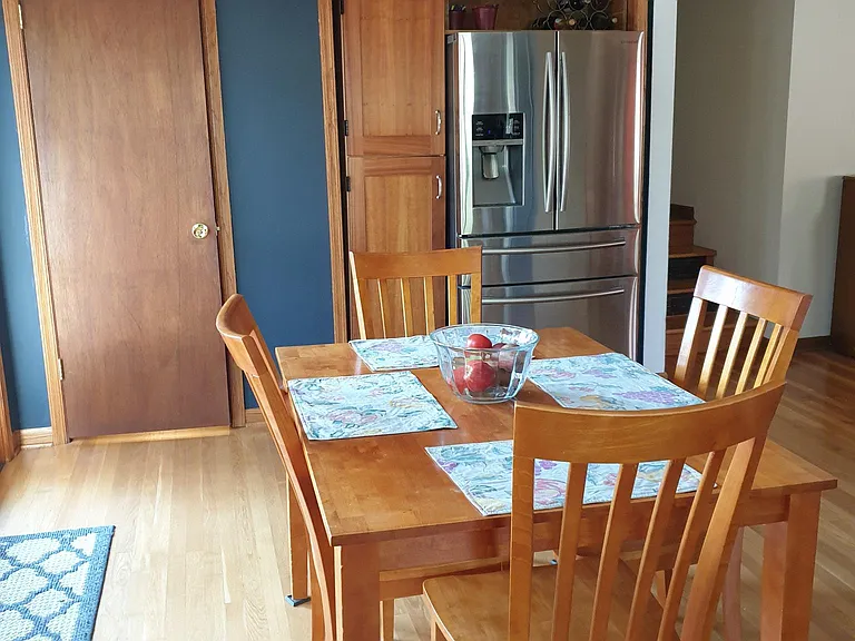 Cherry cabinets and stainless steel appliances