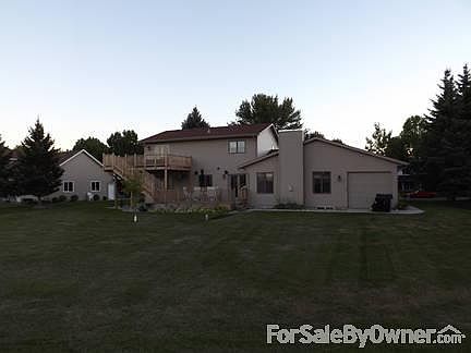 Garage
						:
						3 stalls wide, 3rd stall has 4th tandem stall with garage door to back yard