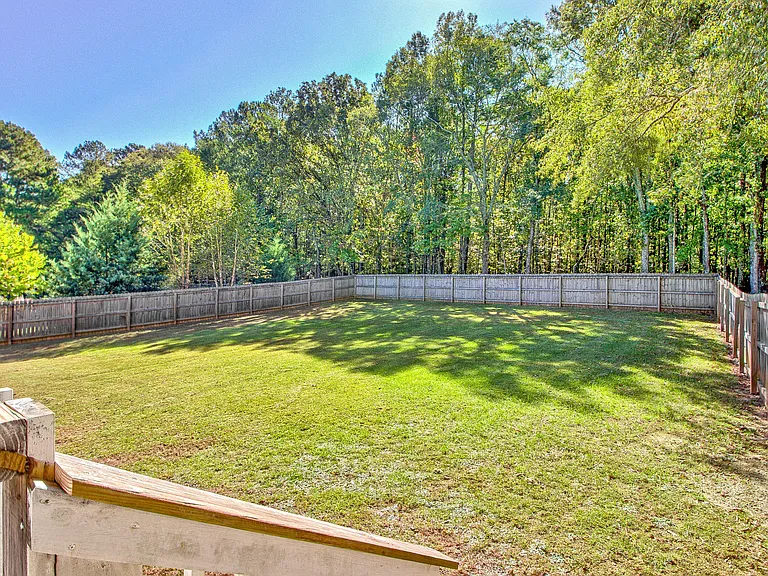 Backyard area looking at it from the back deck