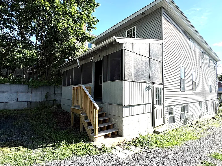 Rear Screened Porch and Side Exterior