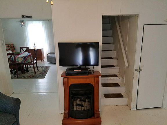 This is the formal living room with gas fireplace !  It s 99