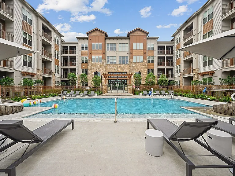 Enjoy sunny days by the resort-style pool.
