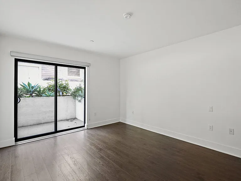 Living Room with Vinyl Flooring and Patio