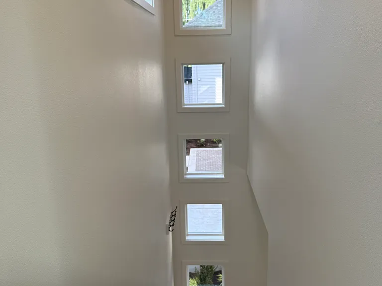 Windows over the stairs.