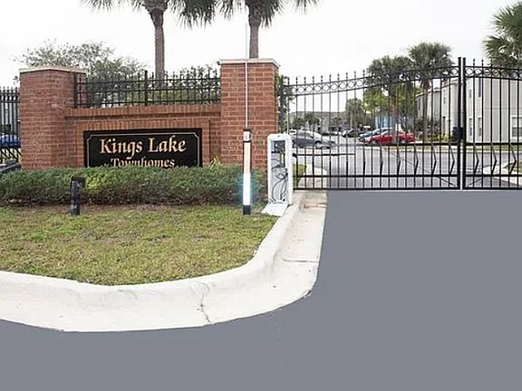 Photo of the gated entrance. There is a second gated entrance/exit at the rear of the complex as well.
