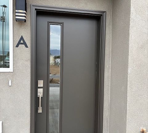 Front door with deadbolt lock