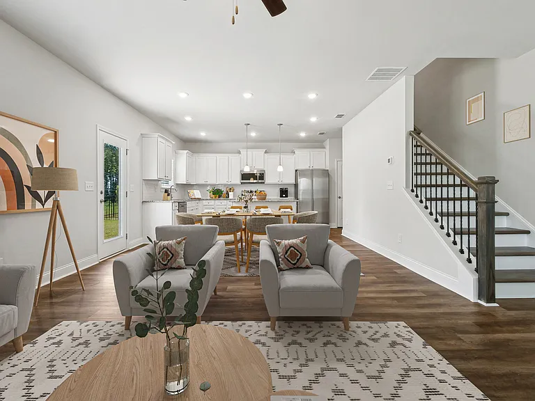 Elegant view of the living room and staircase.