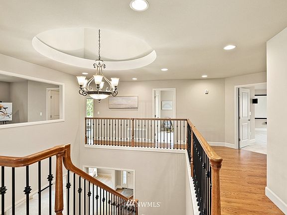 Dramatic skylight illuminates this area.