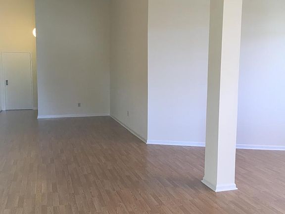dinning room with soaring ceiling