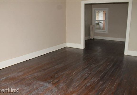 ANOTHER VIEW OF LIVING ROOM FROM SUN ROOM/OFFICE