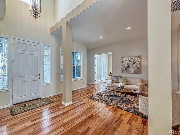 Inside the front door is a flex area you might use as a formal dining room, music room or space for your pool table. The French doors lead to the den or 3rd bedroom.