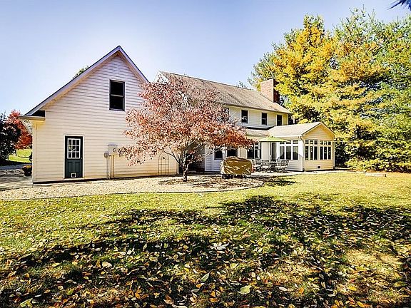 Exterior Rear w/ Stamped Concrete Patio & Covered Stoop