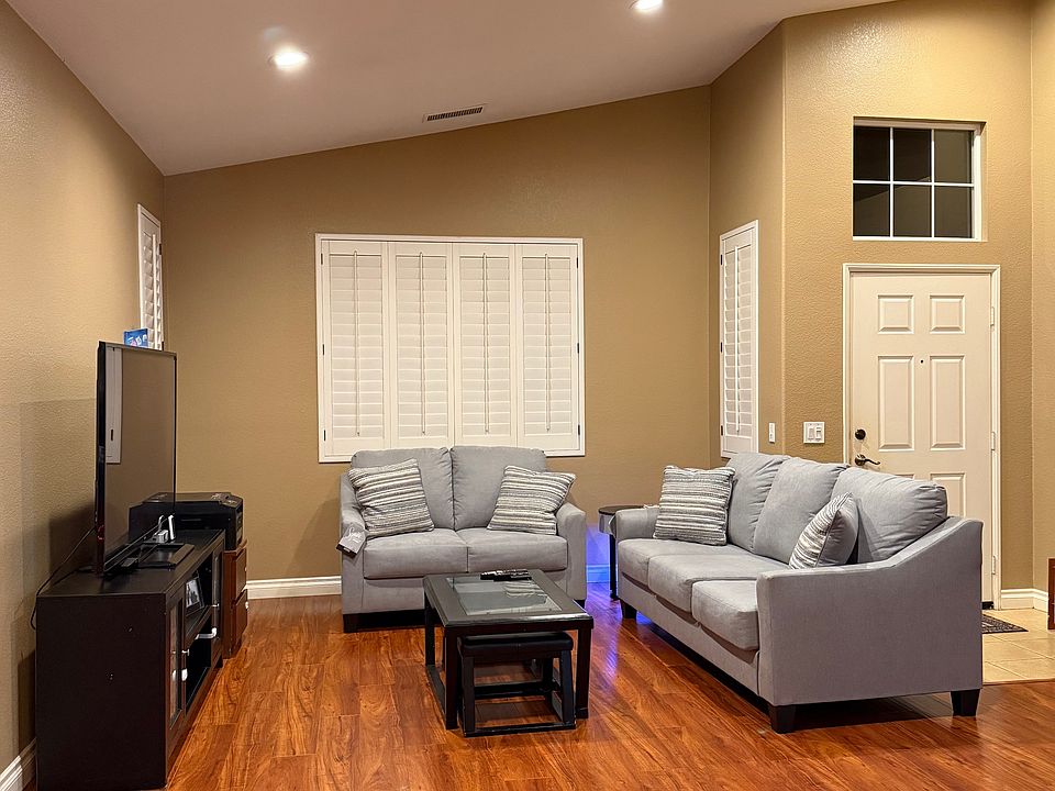 Spacious living room with plenty of light.