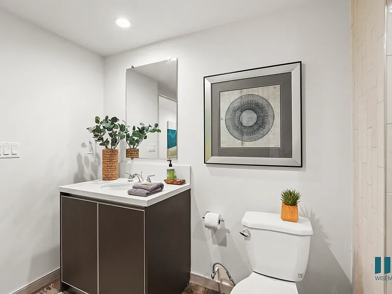 Bathroom with Vanity Cabinet Storage and Toilet