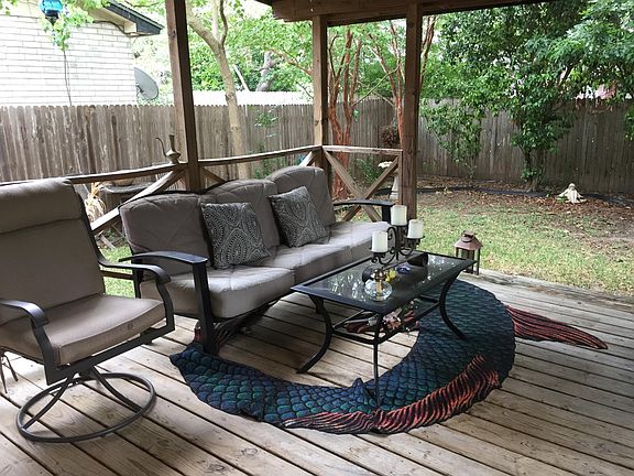 Unwind outside on the large wooden deck and cover.
