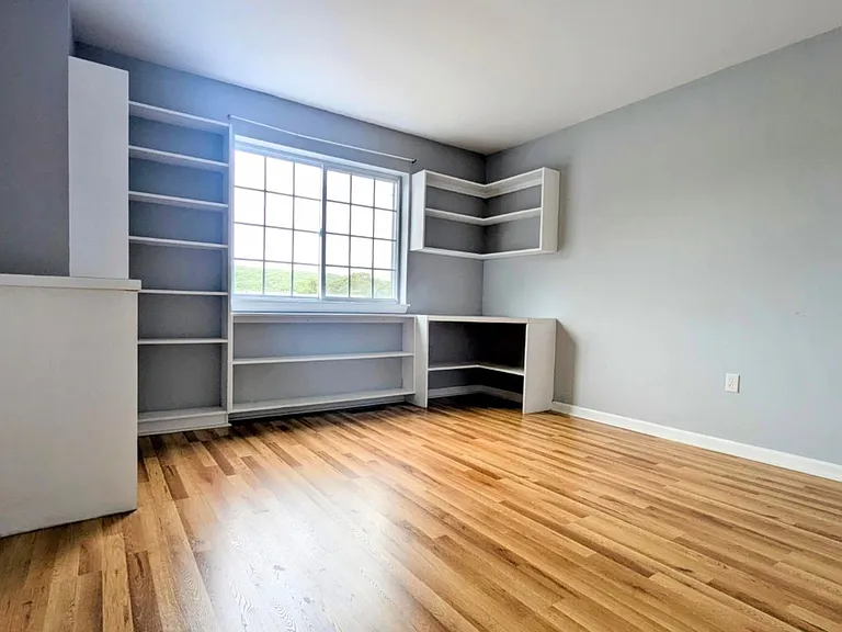 Bedroom 2 (with built-in bookshelf and a built-in desk)