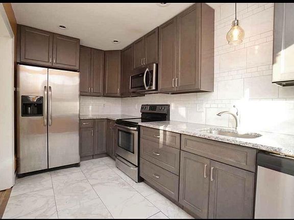 4th image of 6158 Glade Ave