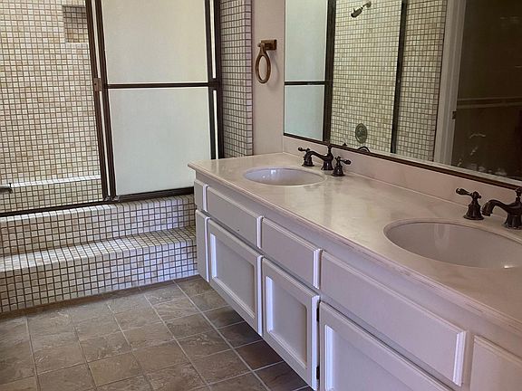 Master bedroom shower and bath.