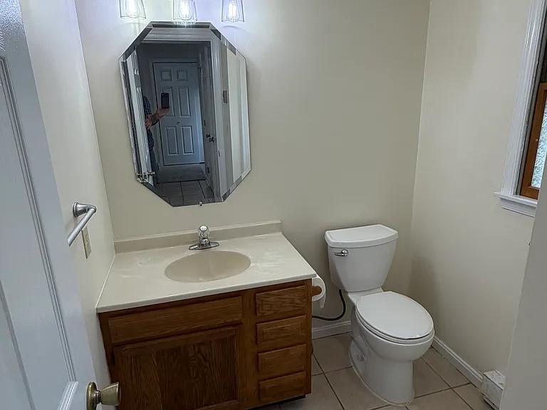 Lovely half bathroom on first floor.