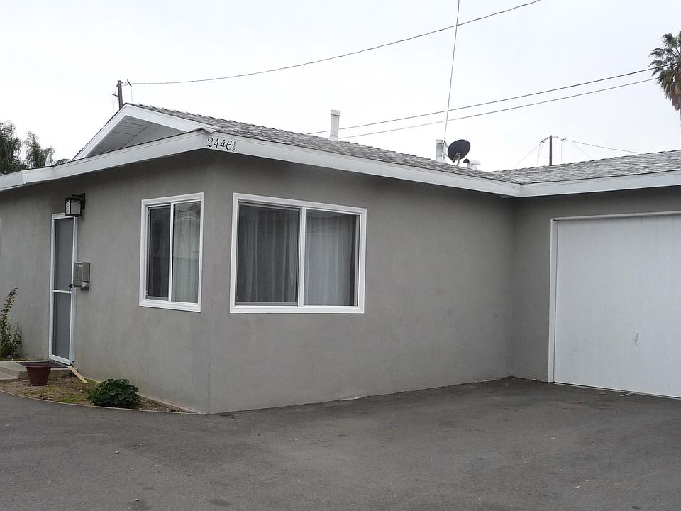 exterior showing single garage and parking space