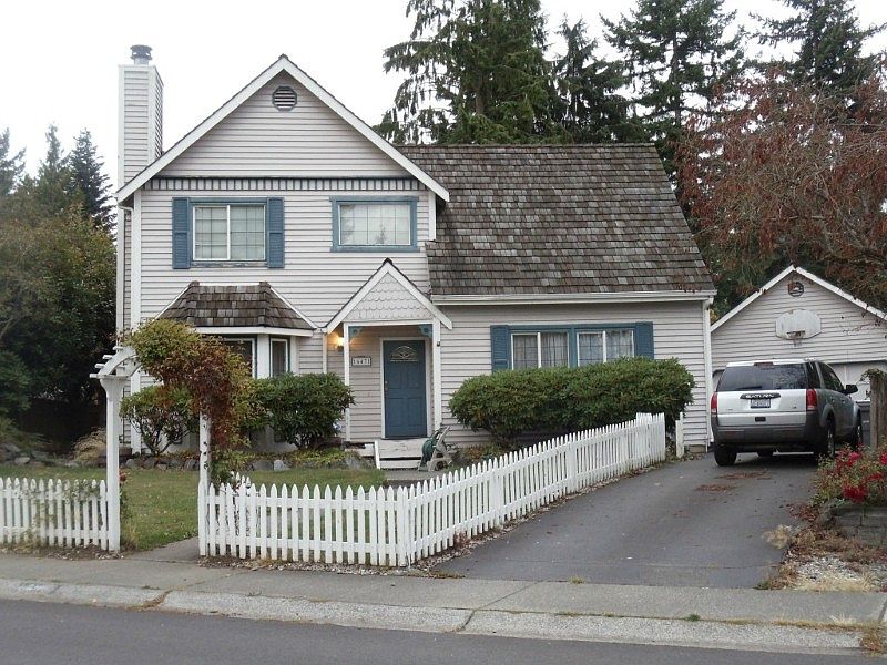 Exterior of home showing detached garage.