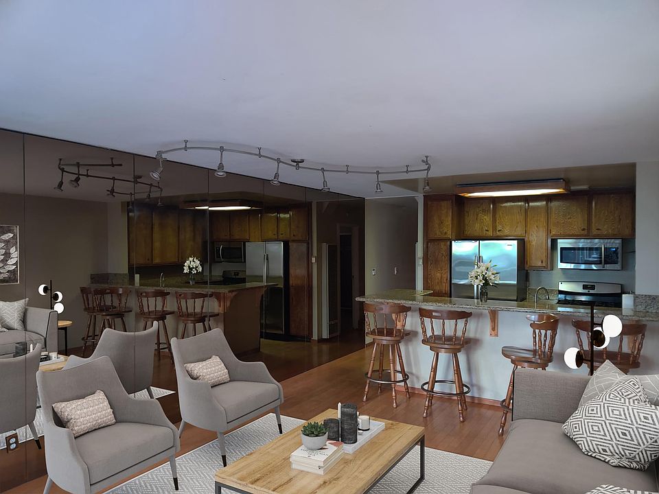 Open Floor plan Living Room with kitchen w/stainless steel appliances