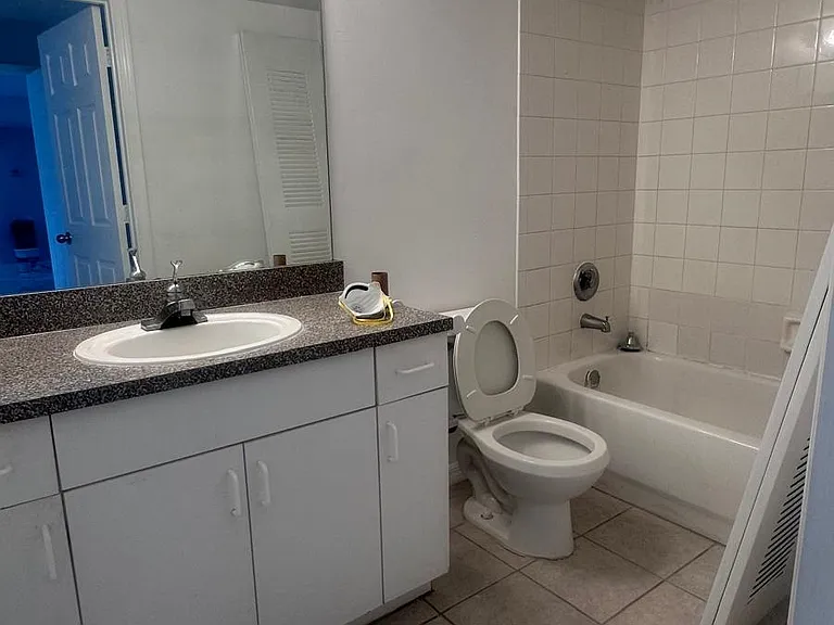 5011 Wiles Rd #207 — Photo 12