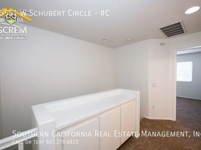 25551 W Schubert Cir #C — Photo 16