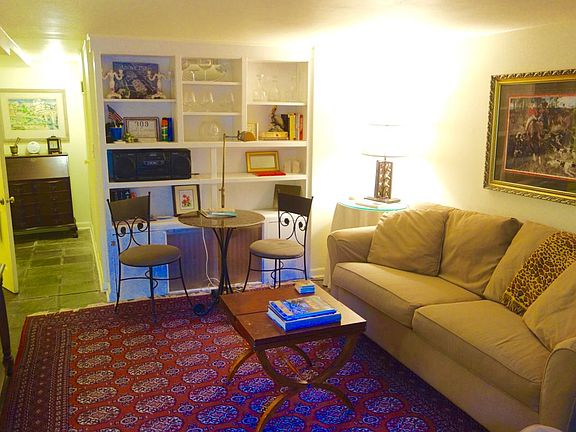 Living room with built-ins and Onkyo blue tooth enables mini