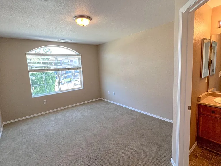 Bedroom2 showing entry to private full bath.