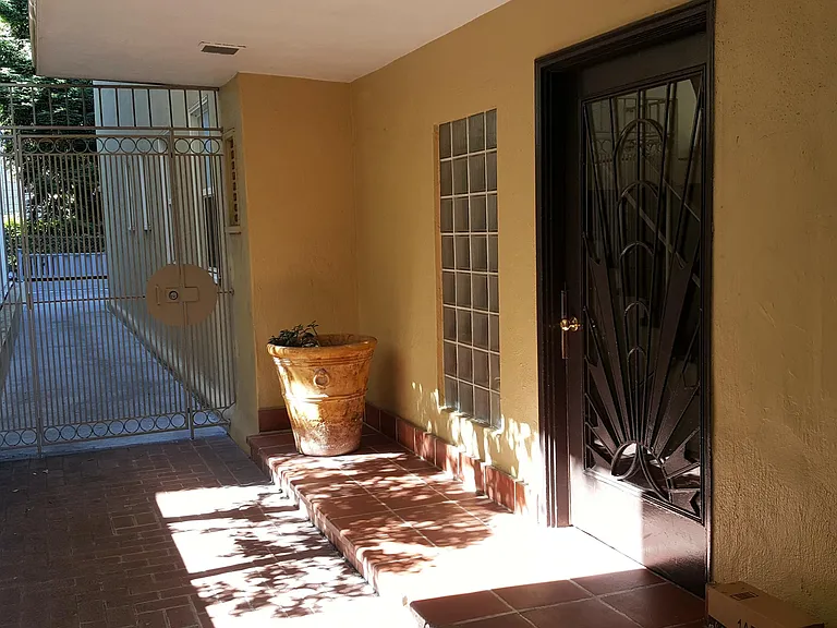 Front door of 24-unit, 3-floor, Condominium complex. Secure and professionally maintained property.