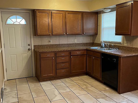 Kitchen with door to backyard