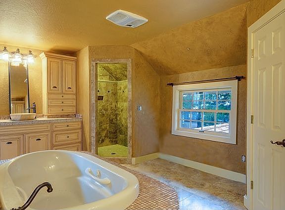 Main floor five piece master bathroom