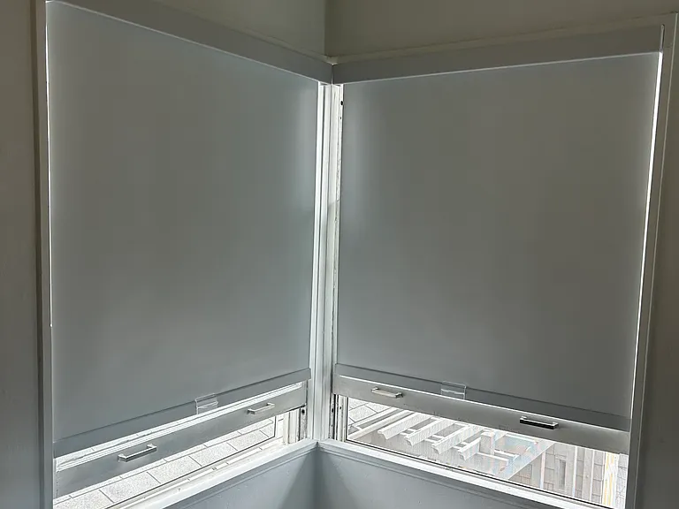 New white black-out shades on all windows
