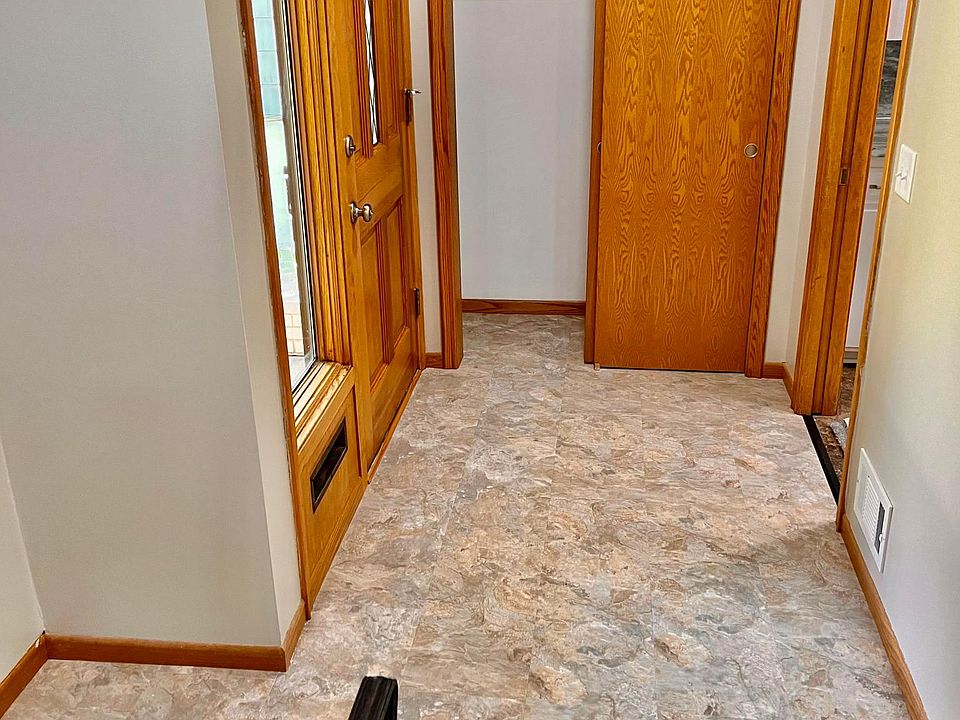 This is the main entry way. The closet was expanded so it could be useful. Either walk straight into the kitchen or head downstairs to the family room.