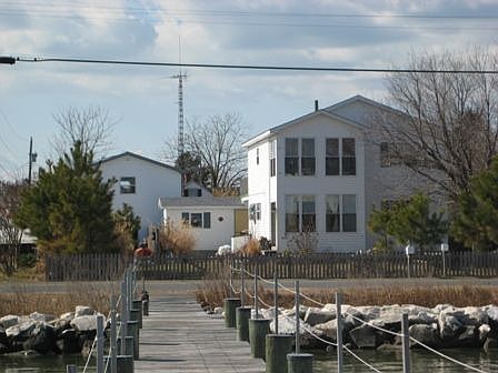 house and garage seen from dock