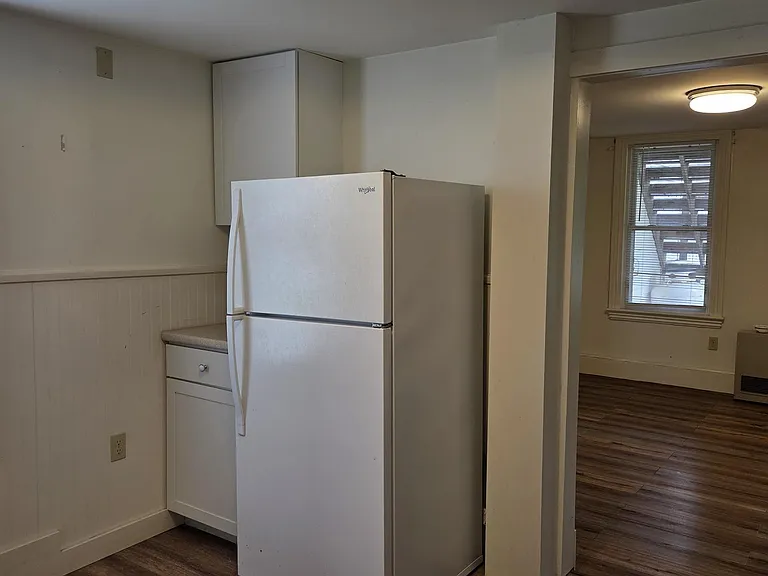 View Of Kitchen Area Looking Into Living Room