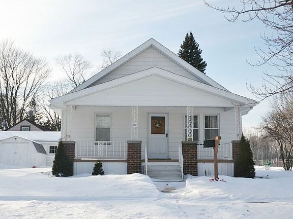 The home features a spacious covered front porch.  Perfect for enjoying the Spring, summer and fall weather. 