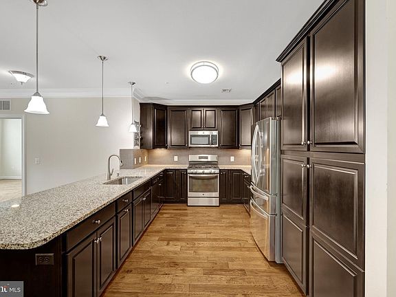 5th image of 13724 Neil Armstrong Ave Unit 404