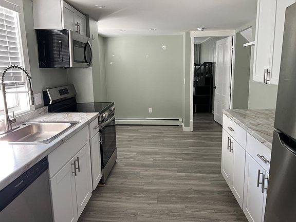 This photo is from another unit in the building. This unit will be of a similar quality and style.