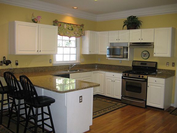 Kitchen boasts granite counter tops and stainless appliances