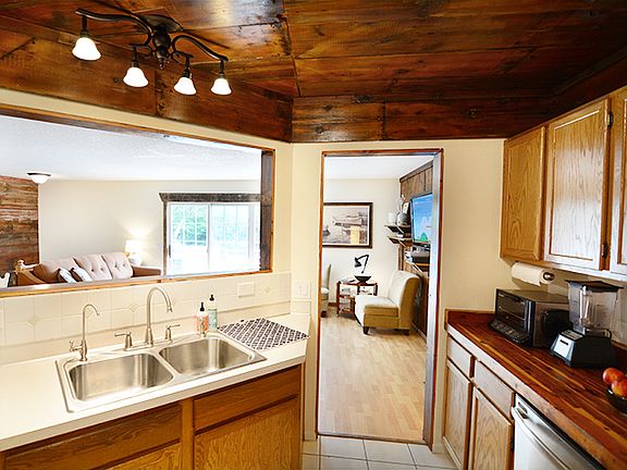 Kitchen looks out on living 