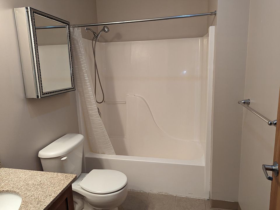 Bathroom off dinning room/living room with medicine cabinet