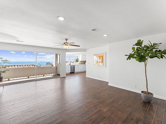 Living room / dining room with balcony